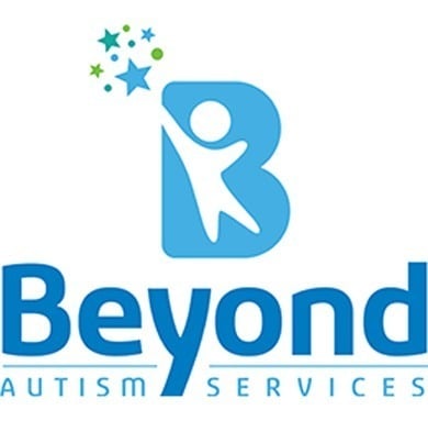 Logo for "Beyond Autism Services" featuring a large blue letter "B" with a human figure inside reaching for blue and green stars above. Ideal for those seeking ABA therapy near Philadelphia PA, with bold “Beyond” and smaller “Autism Services” below.